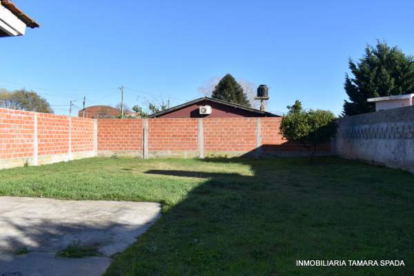 CASA CON QUINCHO Y PARQUE — foto 11