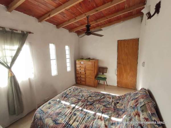 CASA SOLA EN LOTE A DOS CUADRAS DEL ASFALTO — foto 7
