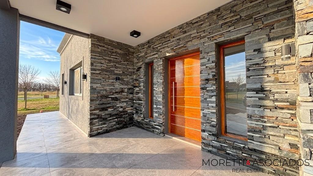 VENTA BARRIO SAN SEBASTIAN | CASA 4 AMBIENTES | A LA LAGUNA | PARRILLA - PILETA - MUELLE — foto 6