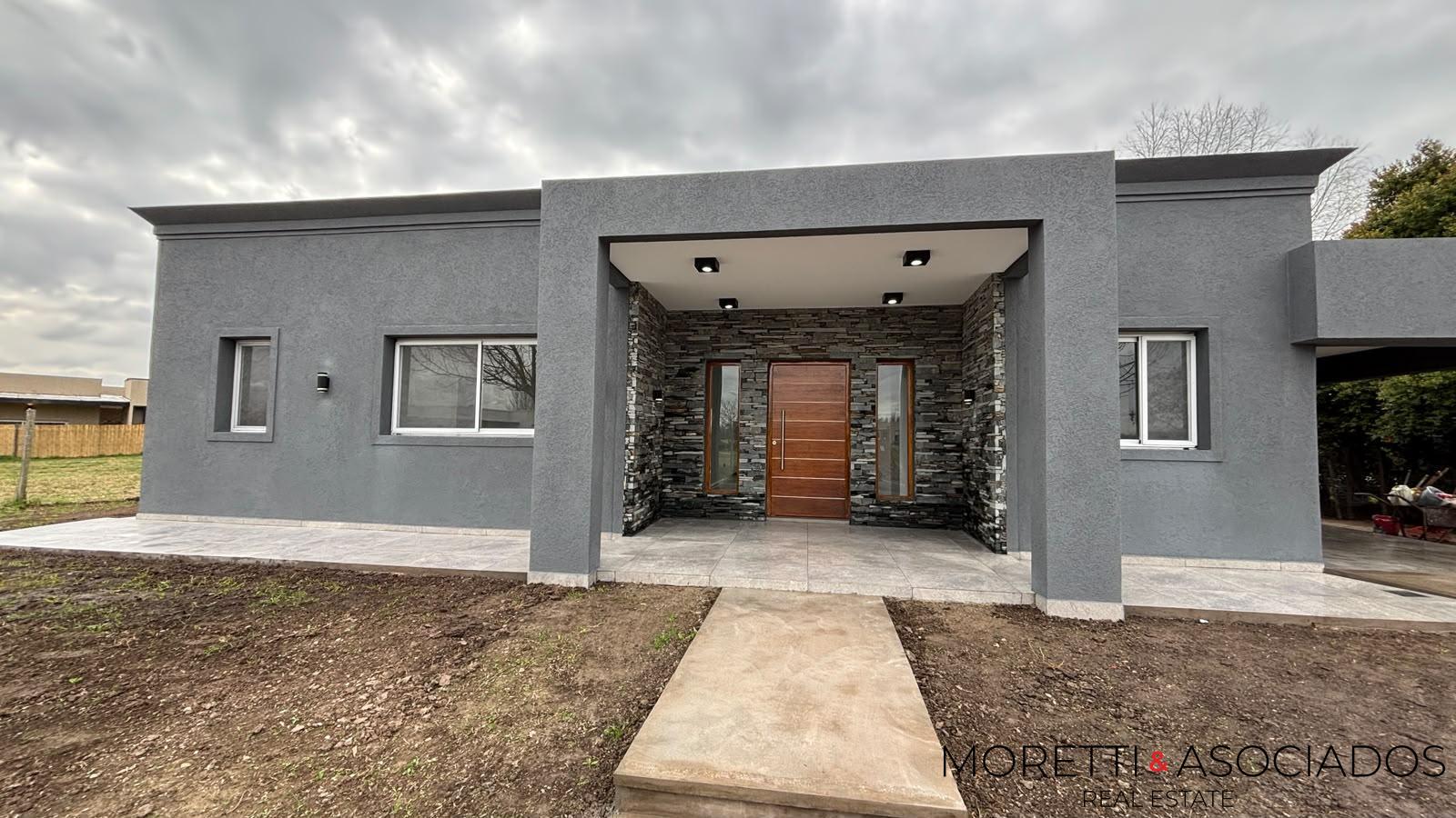 VENTA BARRIO SAN SEBASTIAN | CASA 4 AMBIENTES | A LA LAGUNA | PARRILLA - PILETA - MUELLE — foto 4